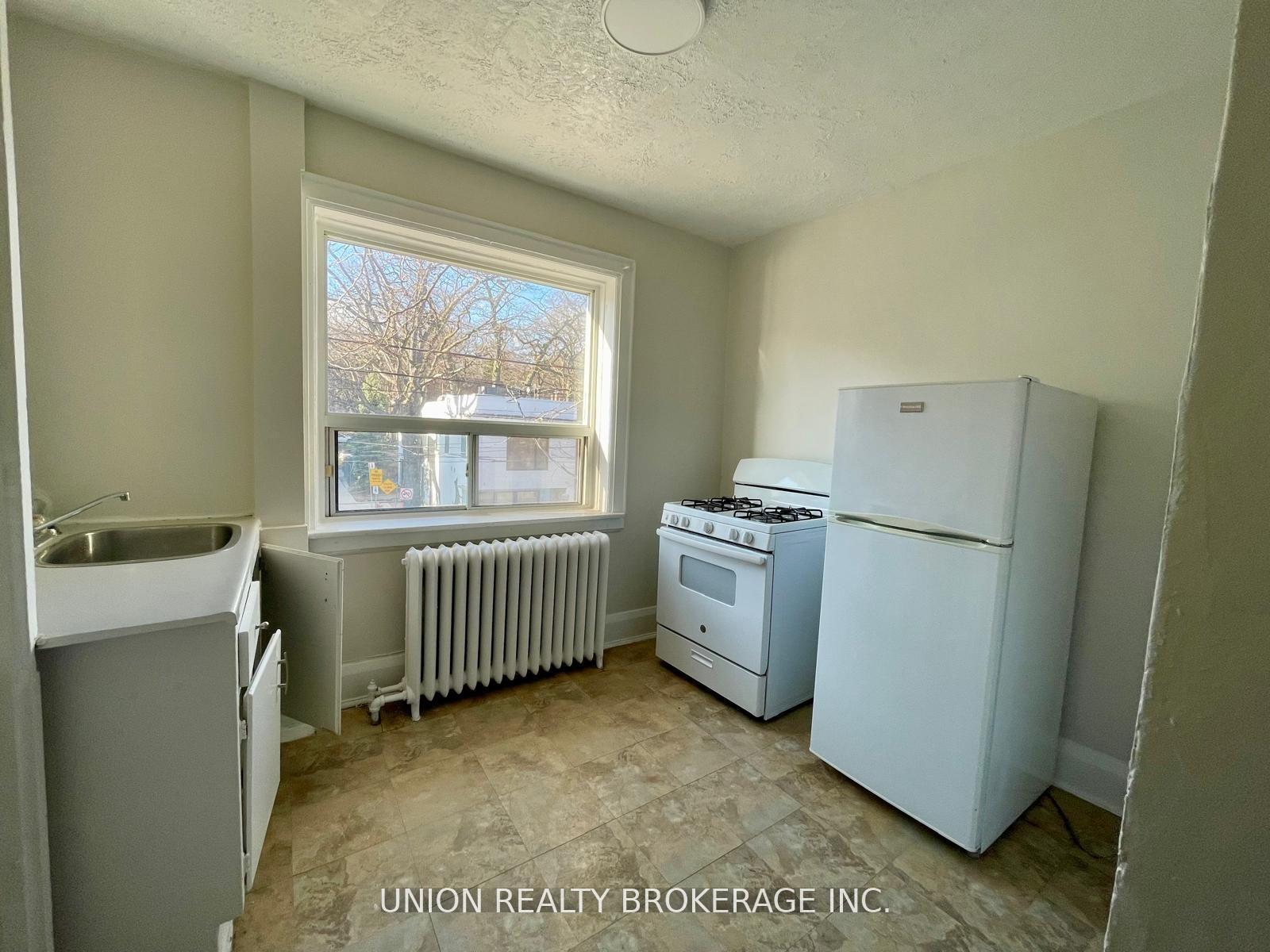 Photo 4 of Unit 24, 2449 Queen Street E, Toronto, The Beaches — HOMEH