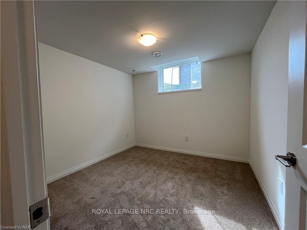 Photo 5 of Unit bsmt, 225 Bur Oak Drive, Thorold, Confederation Heights — HOMEH