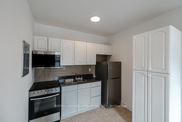 Photo 2 of Unit 402, 110 Wellesley Street E, Toronto, North St. James Town — HOMEH