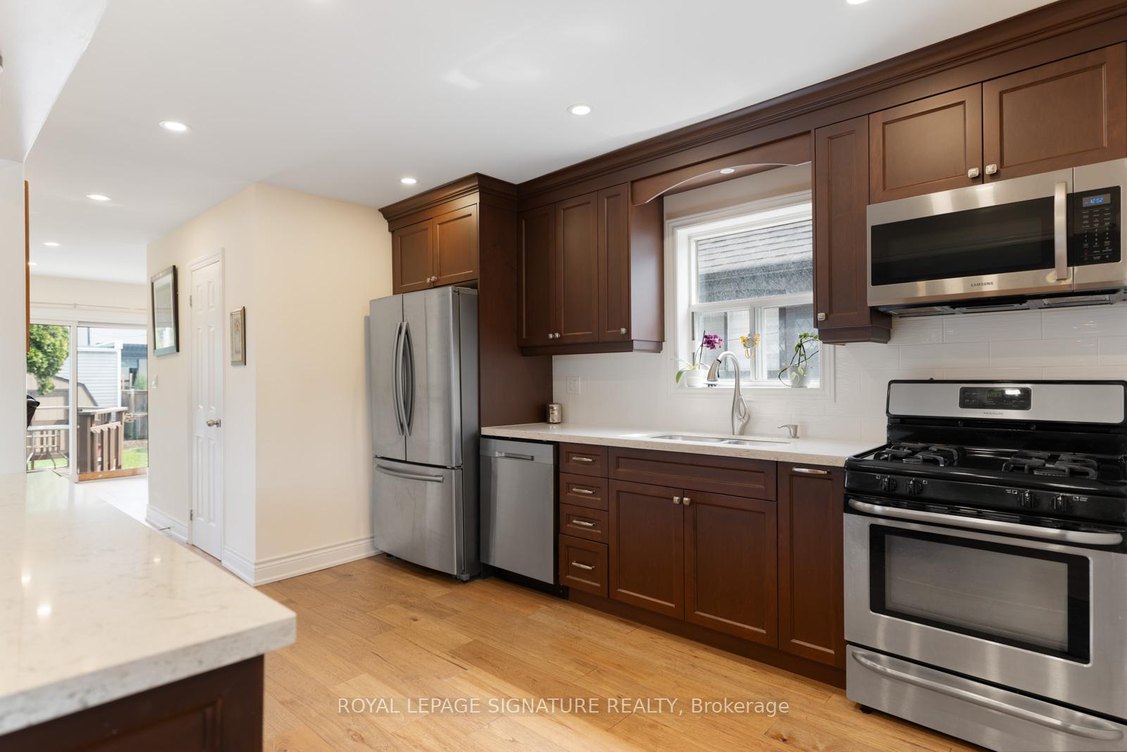 Photo 10 of 27 Norlong Boulevard, Toronto, East York — HOMEH