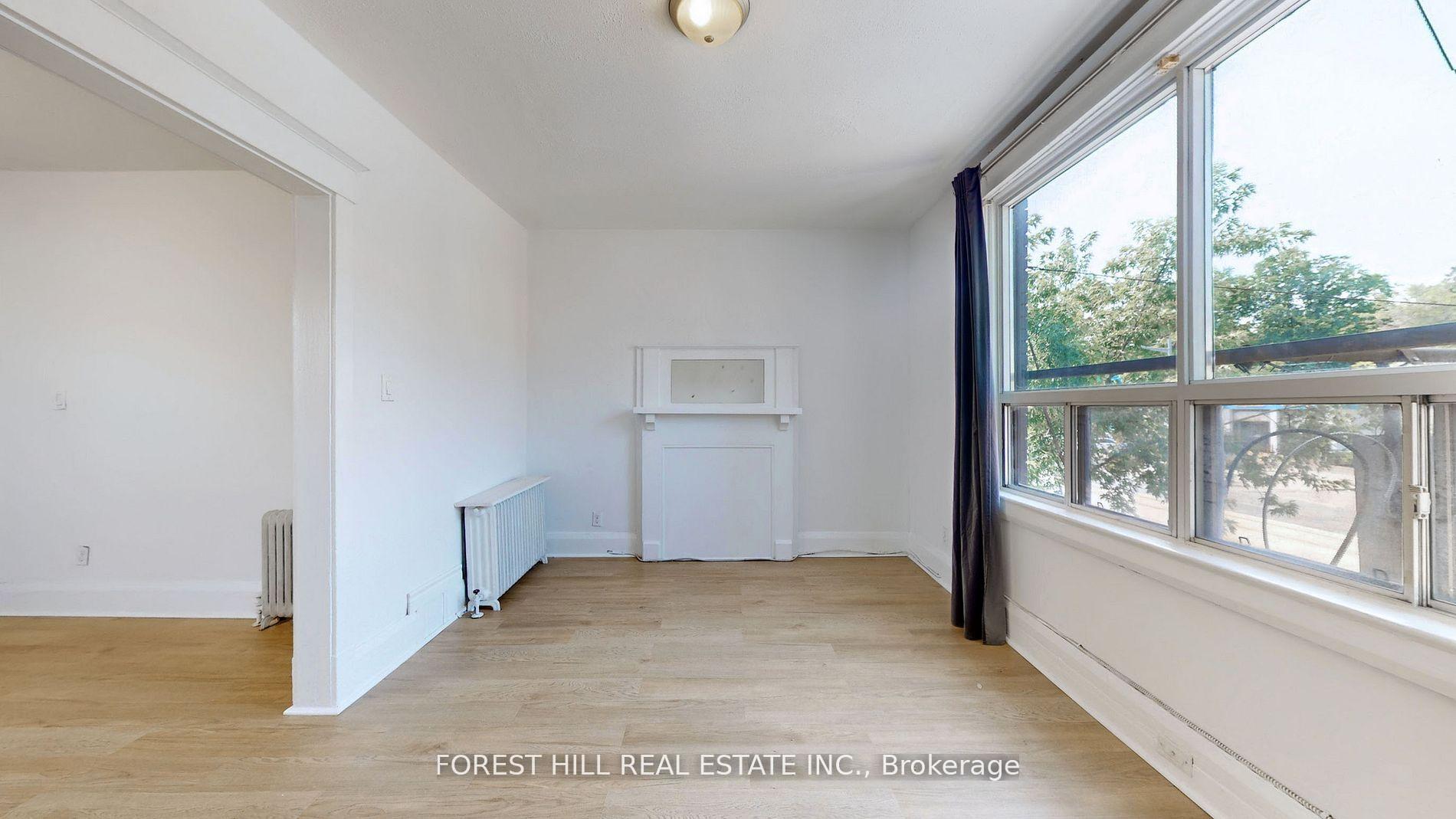 Photo 5 of Unit Upper 1, 645 St Clair Avenue W, Toronto, Wychwood — HOMEH