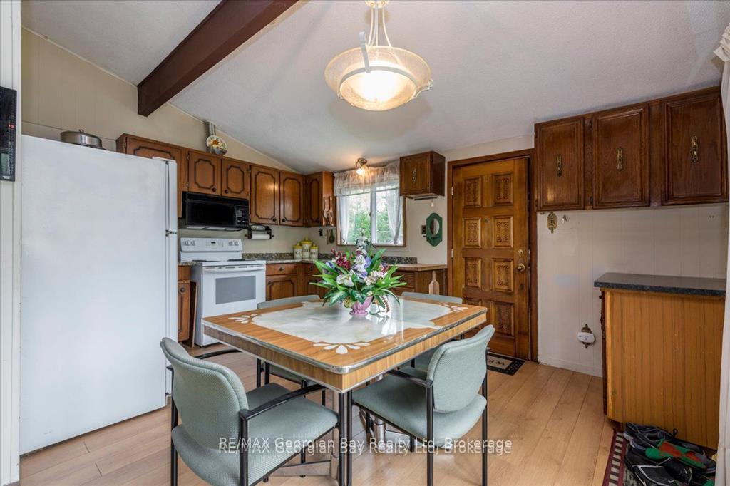 Photo 11 of 25 Tall Pines Drive W, Tiny, Rural Tiny — HOMEH