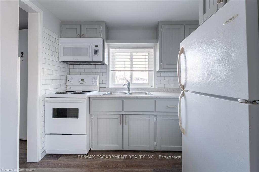 Photo 2 of Unit 1, 8 Cleveland Street, Thorold, Thorold Downtown — HOMEH