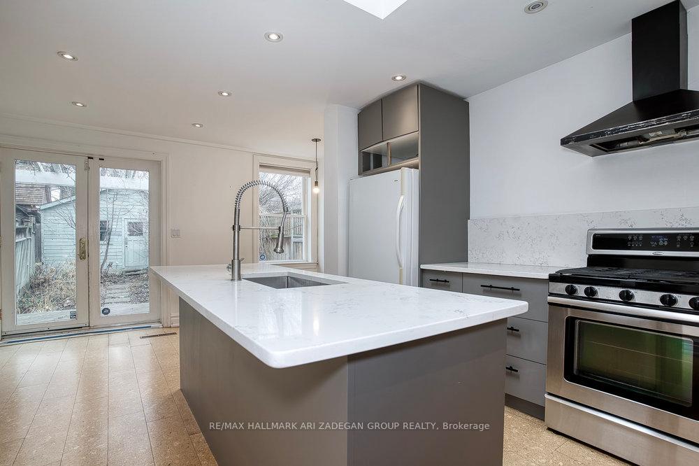 Photo 5 of 75 Eaton Avenue, Toronto, Danforth — HOMEH