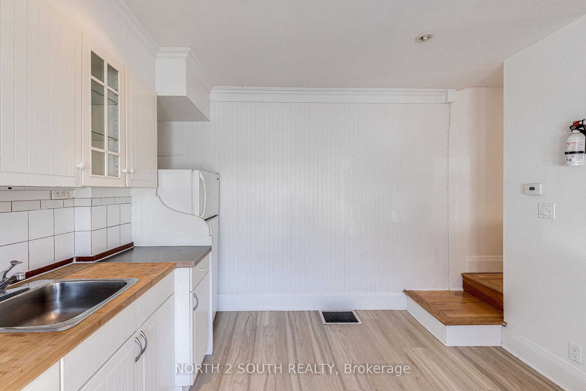 Photo 8 of 731 Rhodes Avenue, Toronto, Greenwood-Coxwell — HOMEH