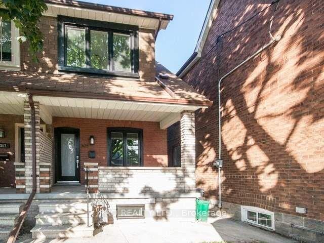 Front of Unit Main/Upper, 305 Winona Drive