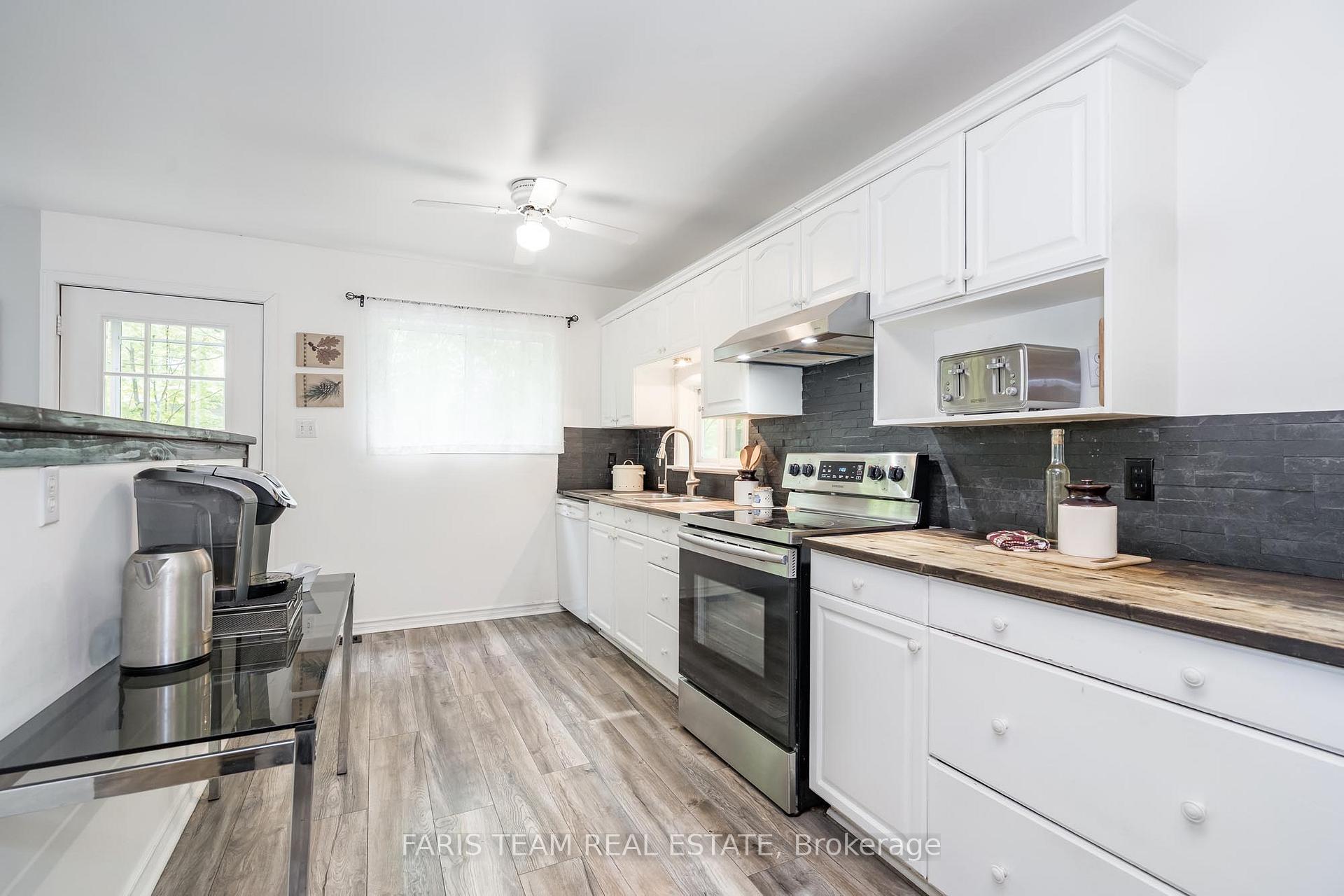 Photo 5 of 1474 Champlain Road, Tiny, Rural Tiny — HOMEH