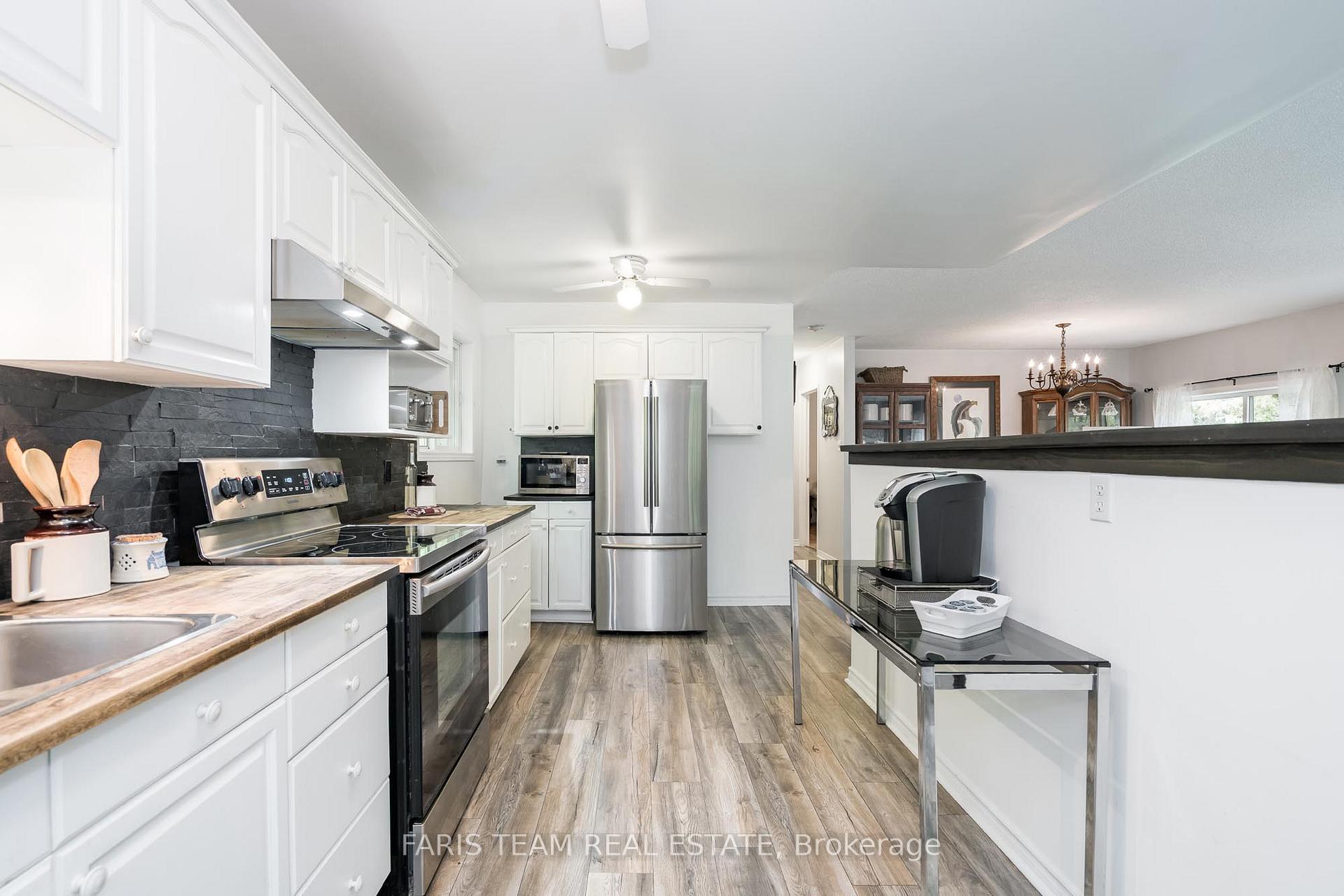 Photo 6 of 1474 Champlain Road, Tiny, Rural Tiny — HOMEH