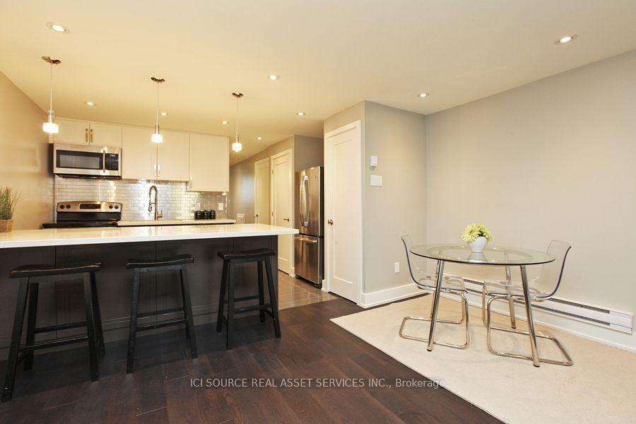 Photo 2 of Unit 1, 12 Dartford Road, Toronto, Playter Estates-Danforth — HOMEH