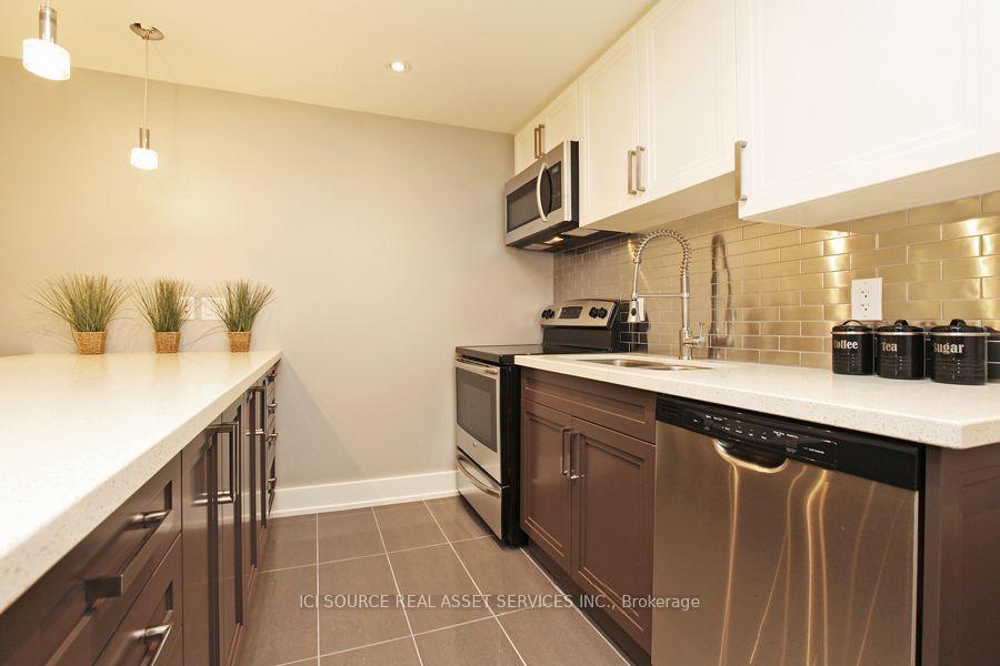 Photo 3 of Unit 1, 12 Dartford Road, Toronto, Playter Estates-Danforth — HOMEH
