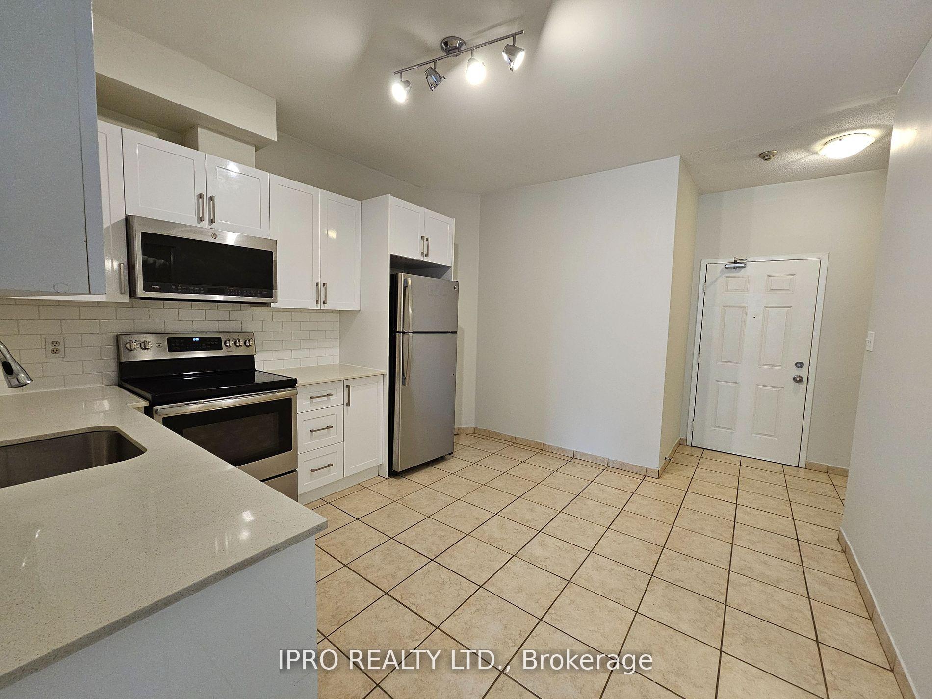 Photo 3 of Unit 211, 1801 Eglinton Avenue W, Toronto, Oakwood Village — HOMEH