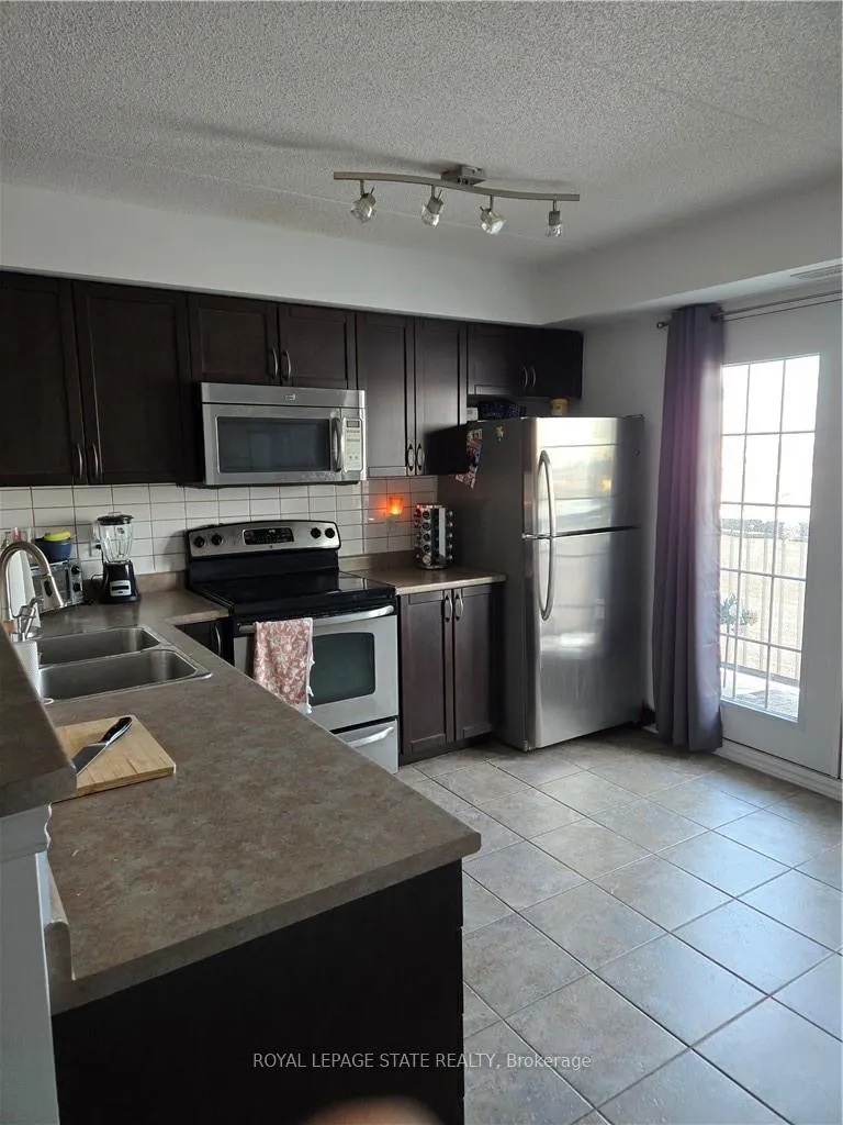 Photo 4 of Unit 305, 1390 Main Street E, Milton, Dempsey — HOMEH