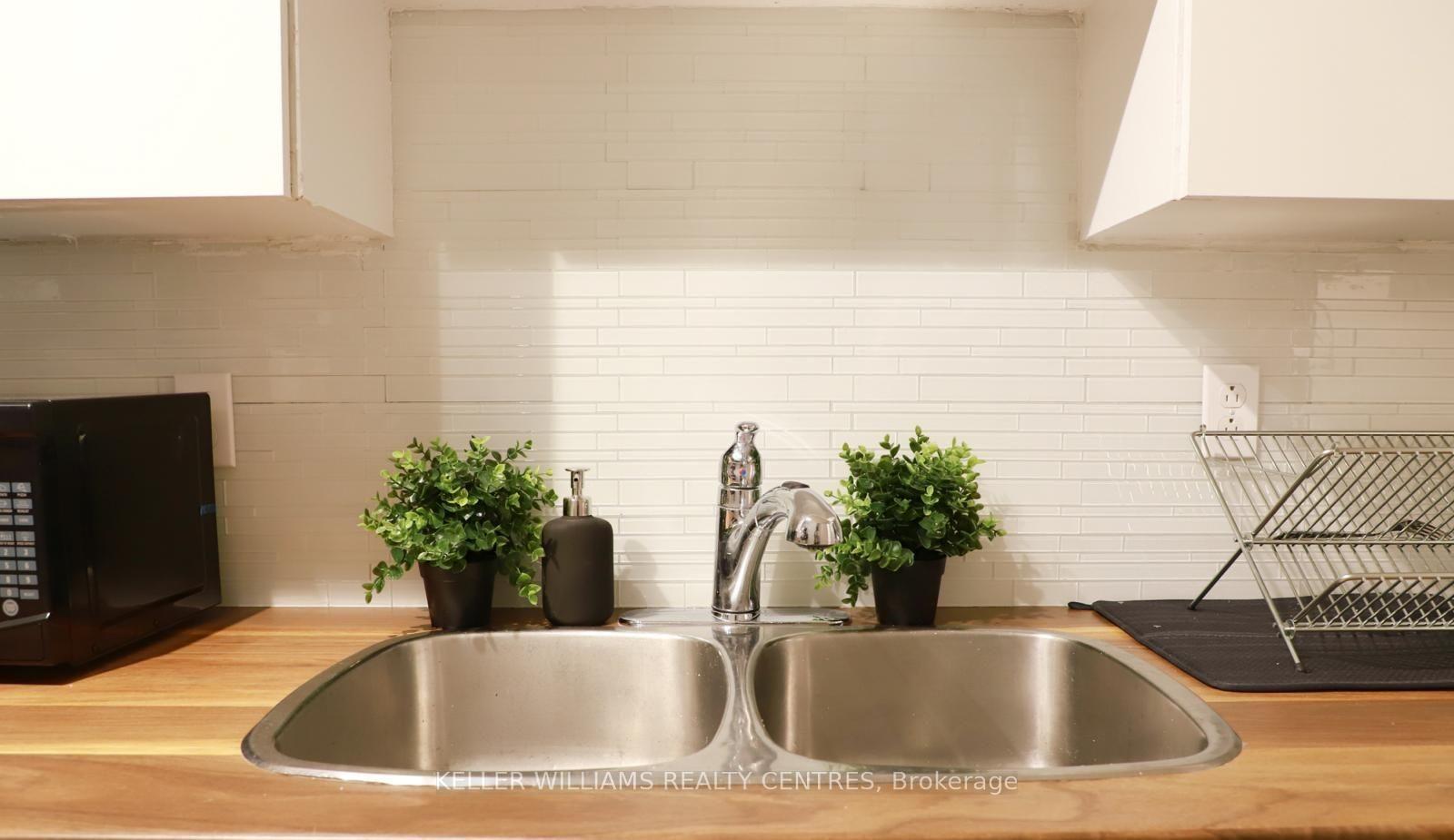 Photo 20 of Unit Upper, 1242 Danforth Avenue, Toronto, Danforth — HOMEH