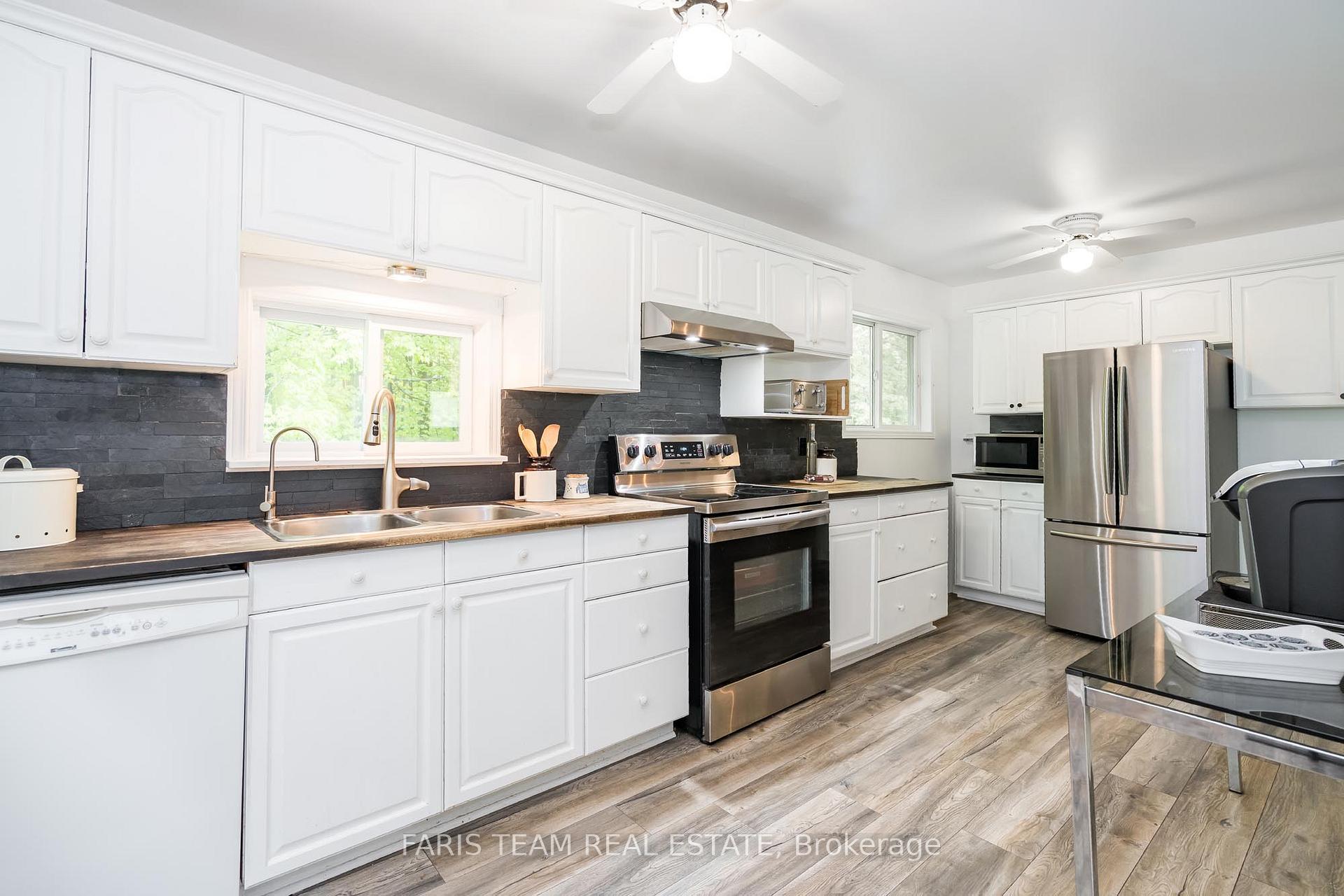 Photo 7 of 1474 Champlain Road, Tiny, Rural Tiny — HOMEH