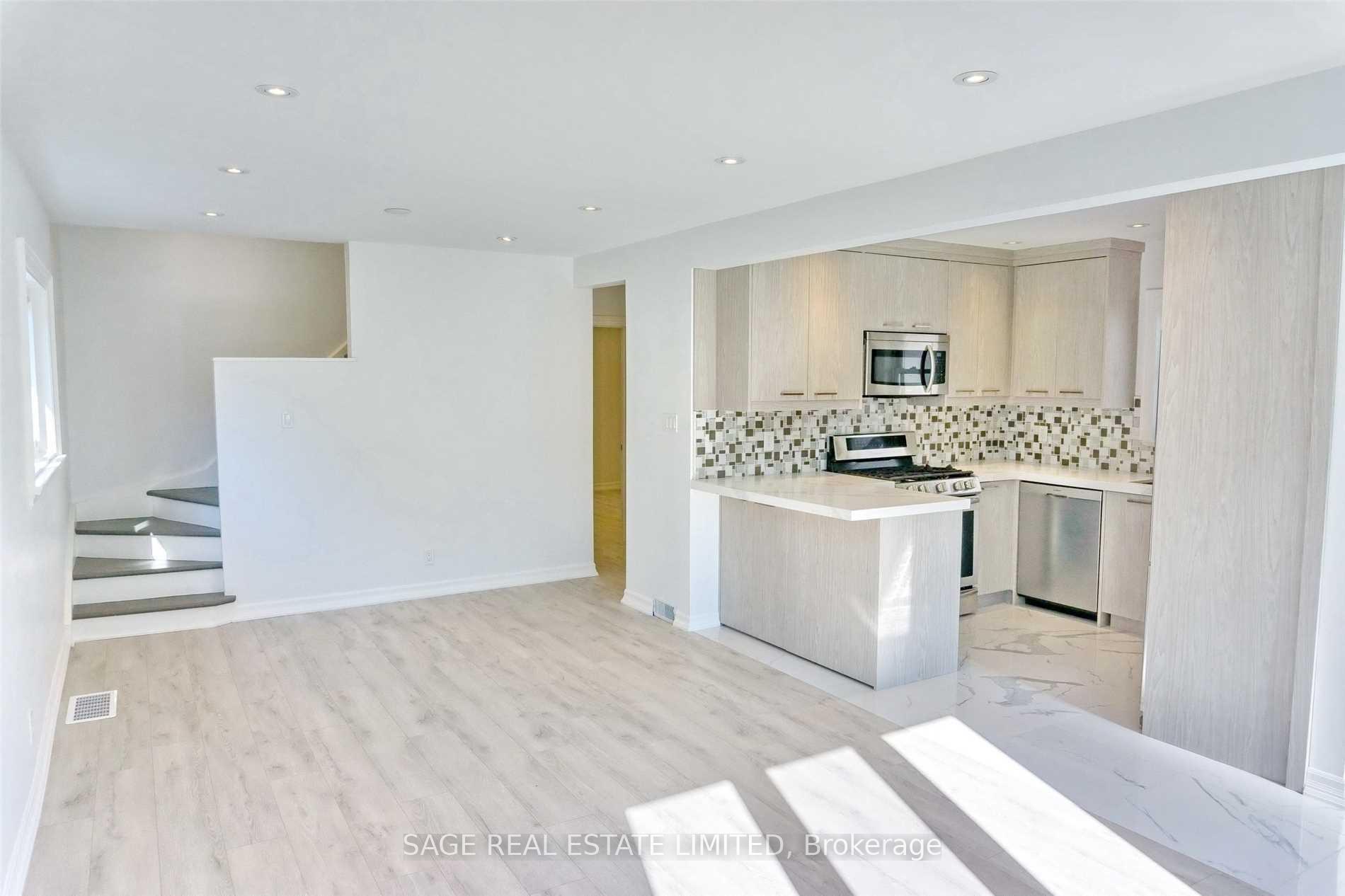 Photo 4 of Unit Main, 21 Norlong Boulevard, Toronto, East York — HOMEH