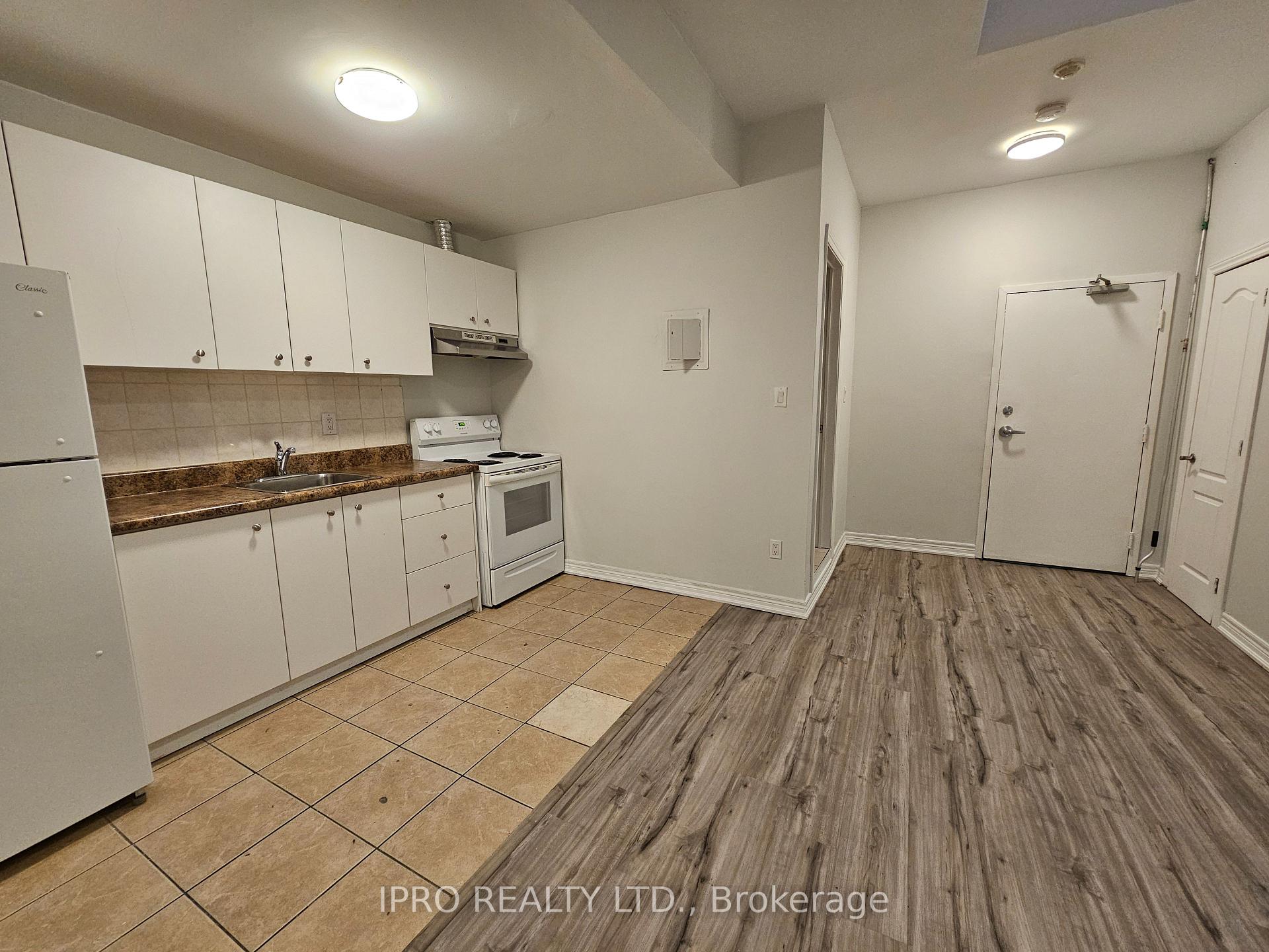 Photo 4 of Unit 302, 1807 Eglinton Avenue W, Toronto, Oakwood Village — HOMEH