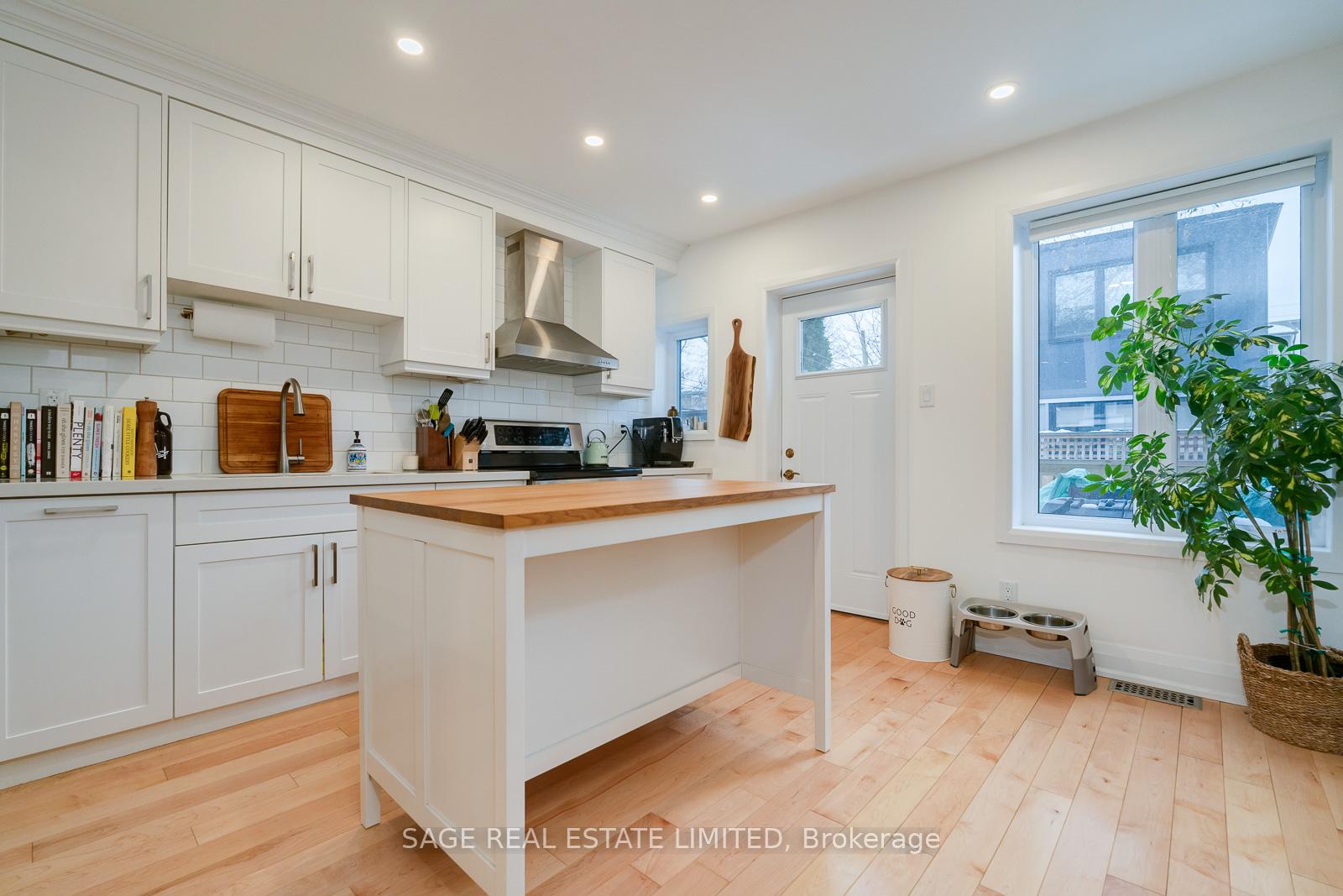 Photo 10 of 128 Langford Avenue, Toronto, Danforth — HOMEH