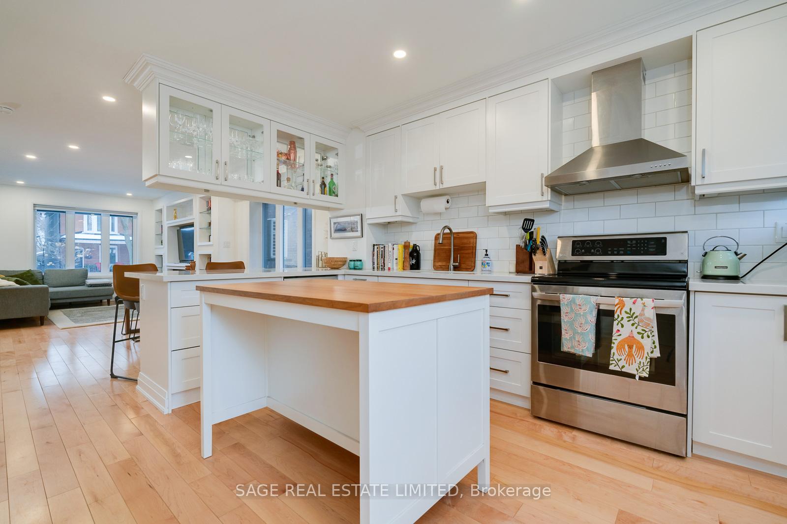 Photo 11 of 128 Langford Avenue, Toronto, Danforth — HOMEH