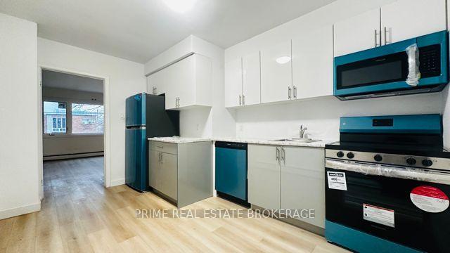 Photo 4 of Unit 1, 103 King Edward Avenue W, Toronto, Woodbine-Lumsden — HOMEH