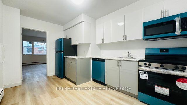 Photo 5 of Unit 1, 103 King Edward Avenue W, Toronto, Woodbine-Lumsden — HOMEH