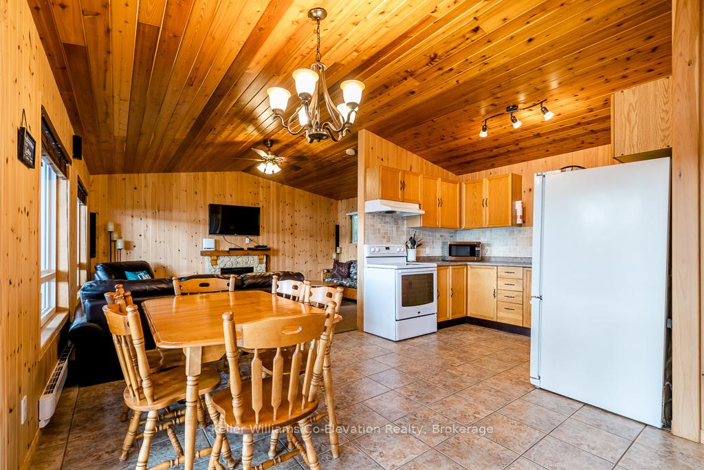 Photo 4 of 180 Farlain Lake Road E, Tiny, Rural Tiny — HOMEH