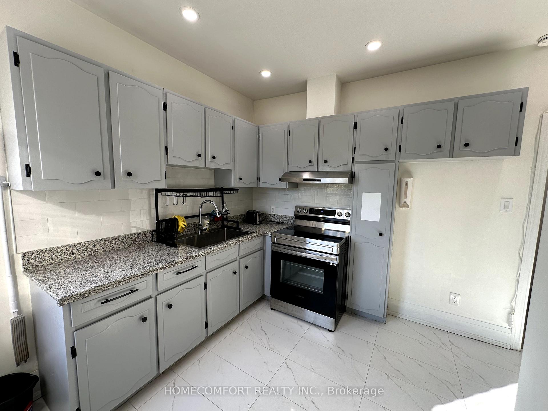 Photo 7 of Unit Main, 33 Strathmore Boulevard, Toronto, Danforth — HOMEH