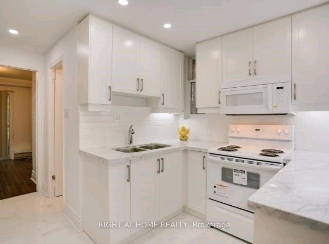 Photo 5 of Unit Unit #2, 34 Macpherson Avenue, Toronto, The Annex — HOMEH