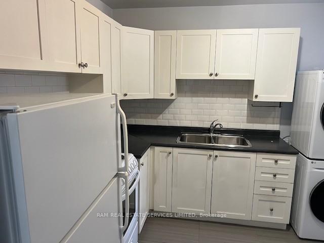 Photo 4 of Unit #1 Front, 564 Queen Street W, Toronto, Kensington-Chinatown — HOMEH