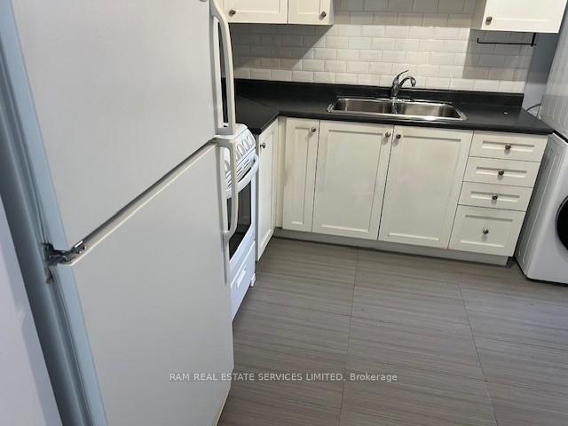 Photo 5 of Unit #1 Front, 564 Queen Street W, Toronto, Kensington-Chinatown — HOMEH