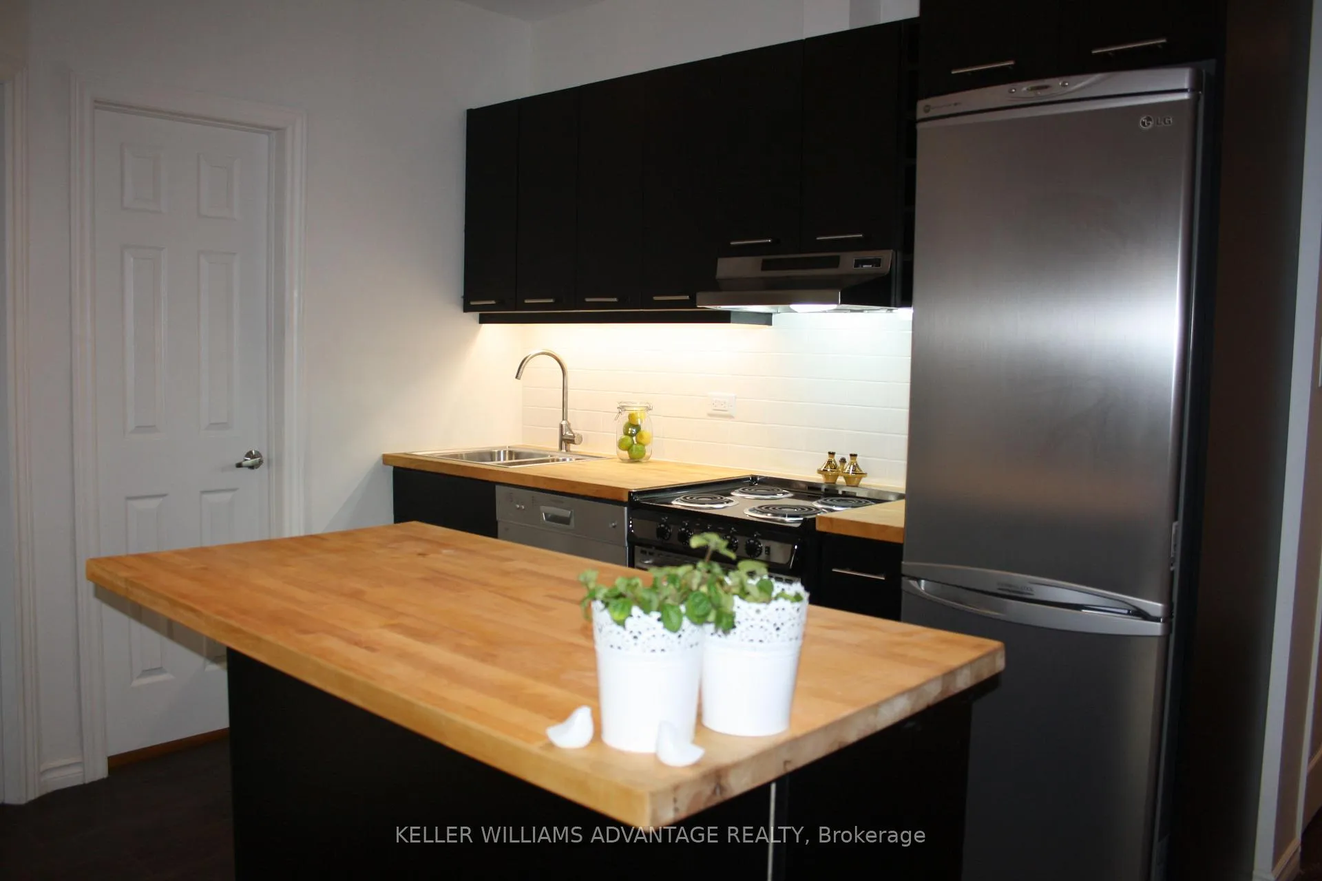 Photo 3 of Unit B, 242 Highfield Road, Toronto, Greenwood-Coxwell — HOMEH