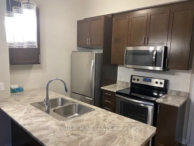 Photo 2 of Unit 824, 2490 Old Bronte Road, Oakville, Westmount — HOMEH