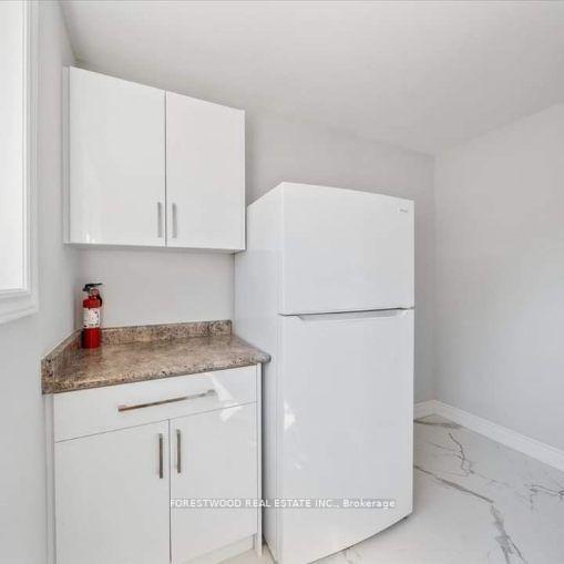 Photo 21 of 26 Thirty Eighth Street, Etobicoke, Long Branch — HOMEH