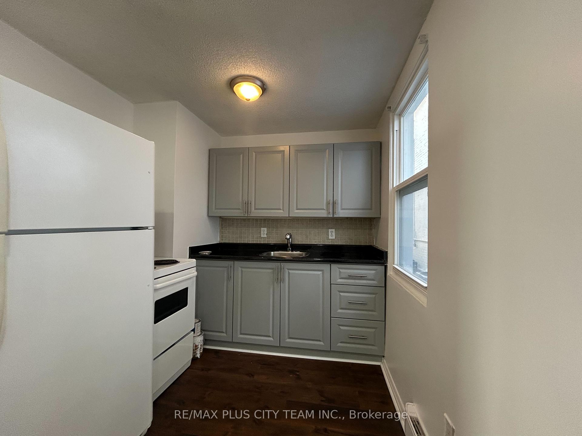 Photo 2 of Unit 2, 26 Victoria Street, Etobicoke, Mimico — HOMEH