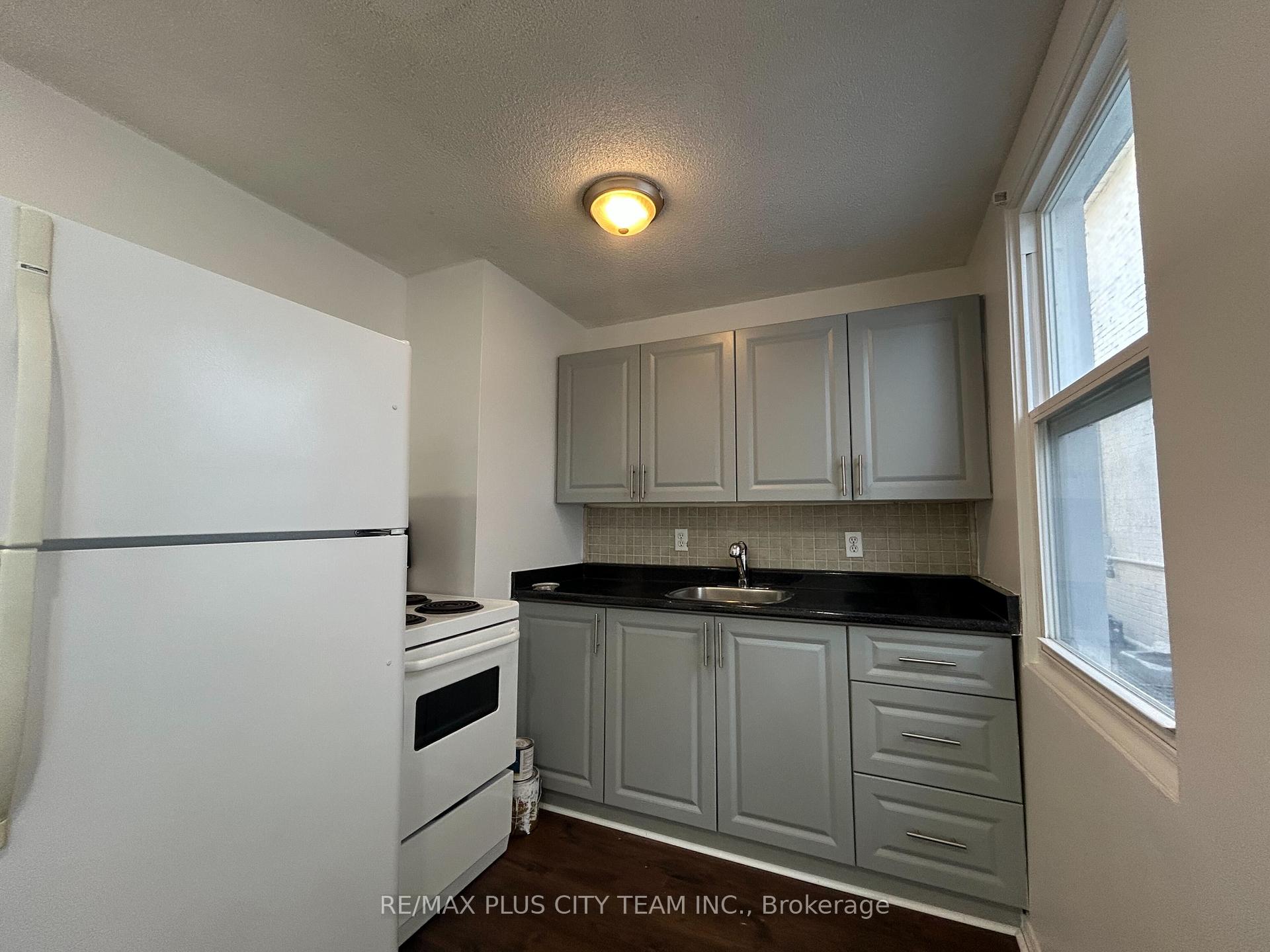 Photo 3 of Unit 2, 26 Victoria Street, Etobicoke, Mimico — HOMEH