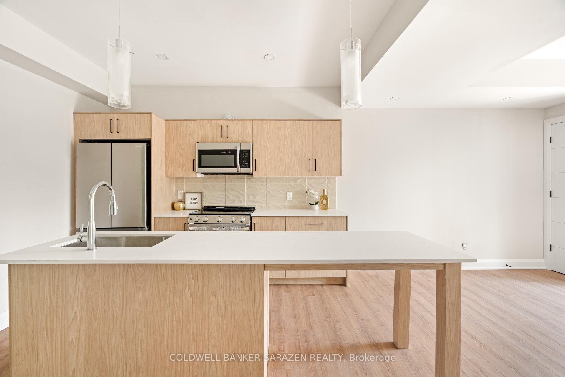 Photo 5 of Unit 002, 10 Mcarthur Avenue, Ottawa, Vanier — HOMEH
