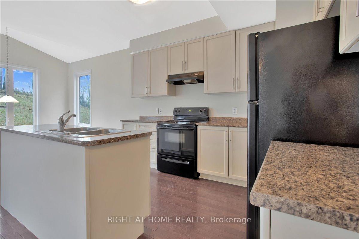 Photo 11 of 72 Christy Drive, Wasaga Beach — HOMEH