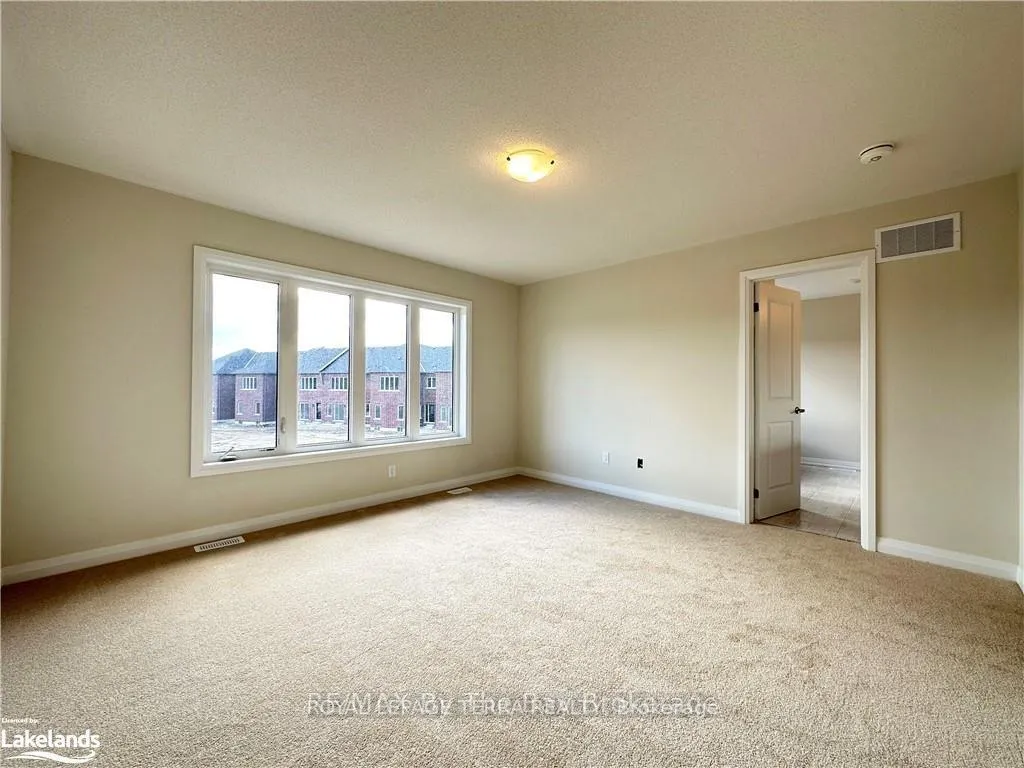 Photo 8 of 58 Nicort Road, Wasaga Beach — HOMEH