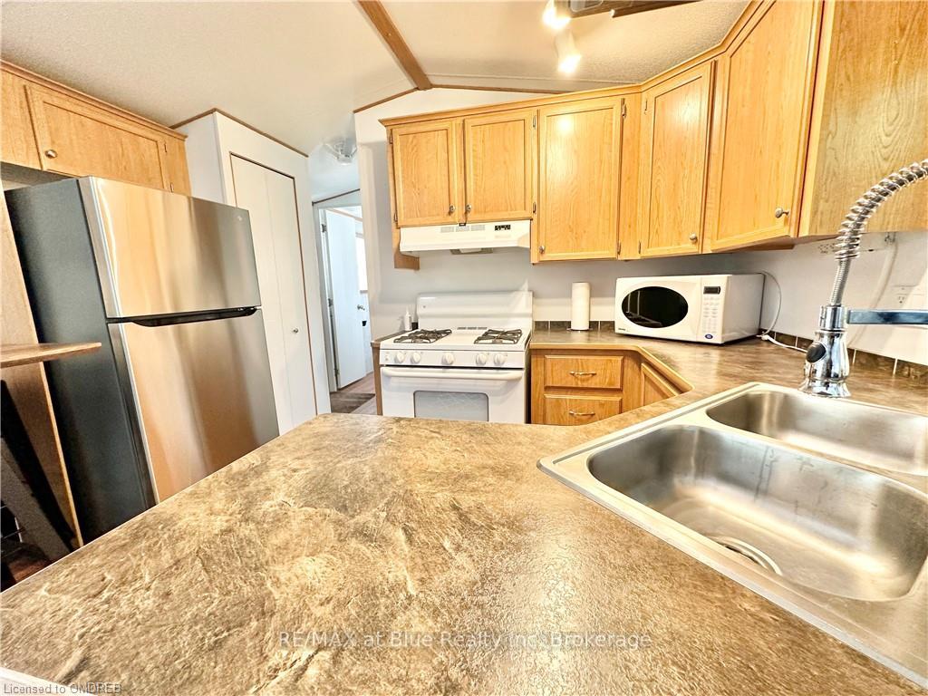 Photo 5 of Unit E7, 7489 Sideroad 5 E, Wellington North, Rural Wellington North — HOMEH