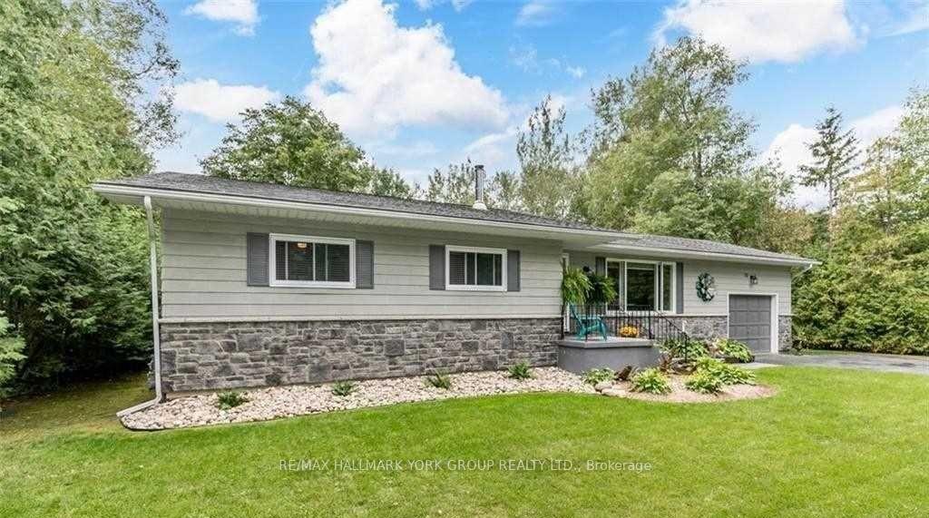 Photo 3 of 52 Birchwood Trail, Wasaga Beach — HOMEH