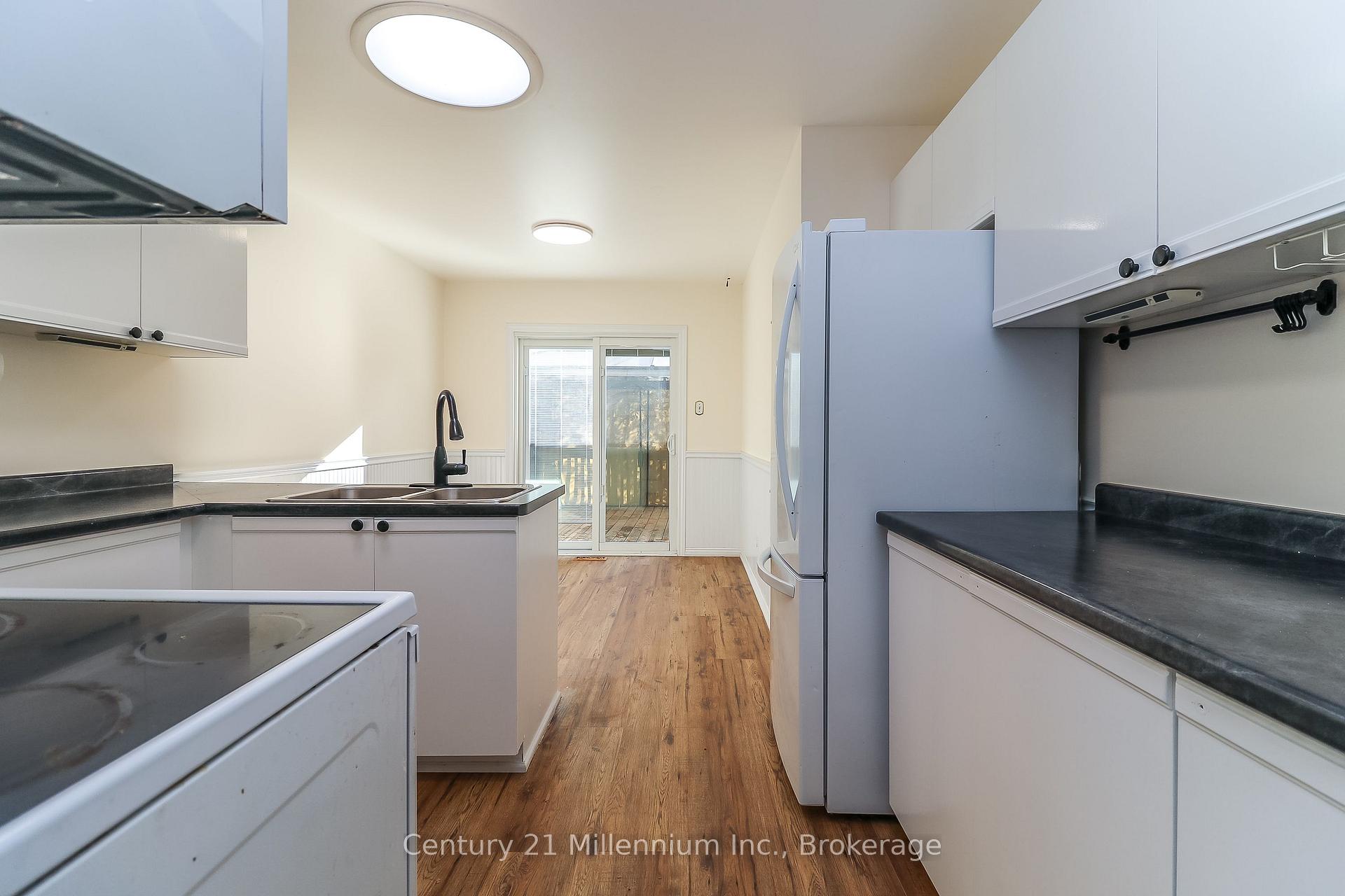 Photo 8 of 71 Donald Crescent, Wasaga Beach — HOMEH