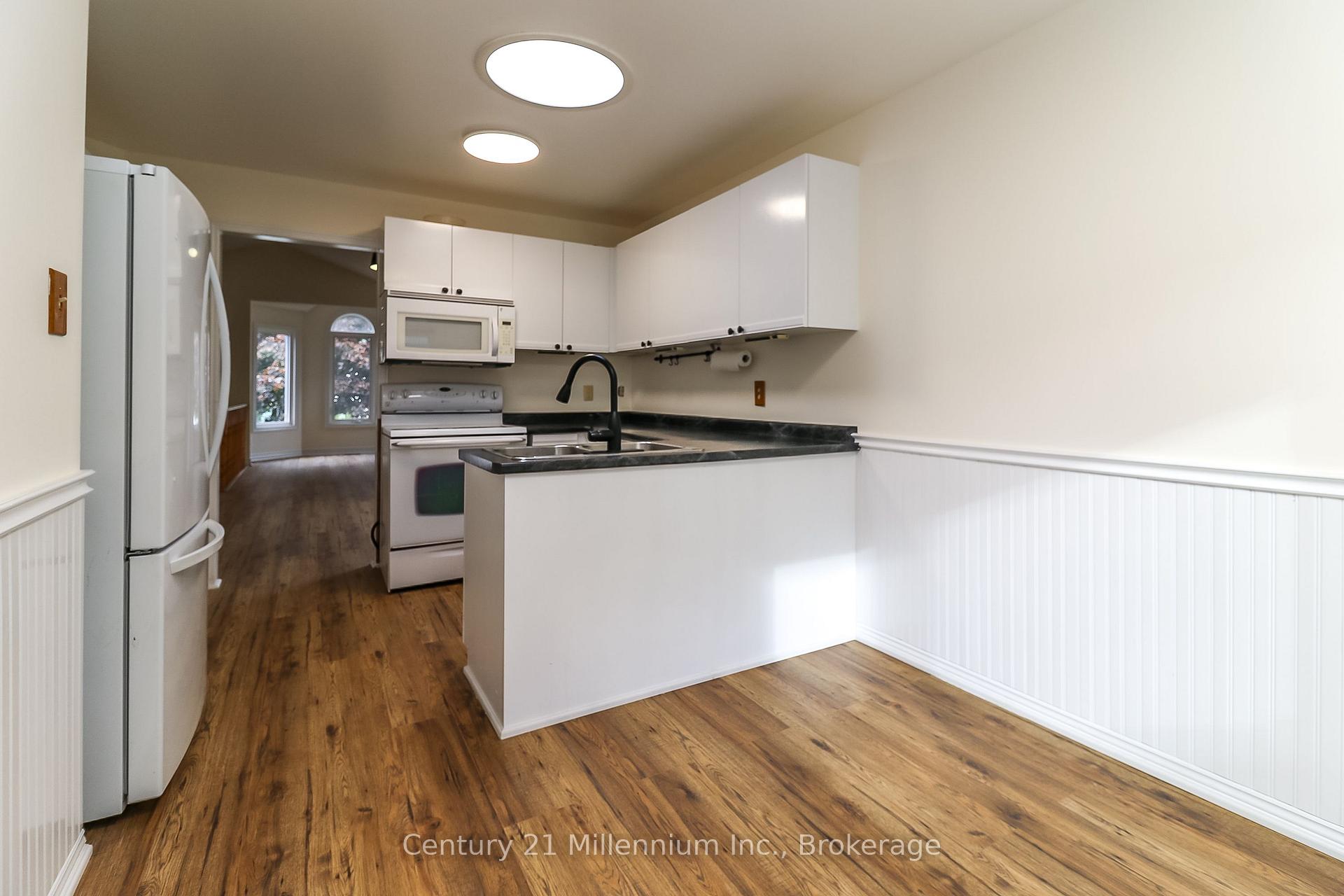Photo 10 of 71 Donald Crescent, Wasaga Beach — HOMEH