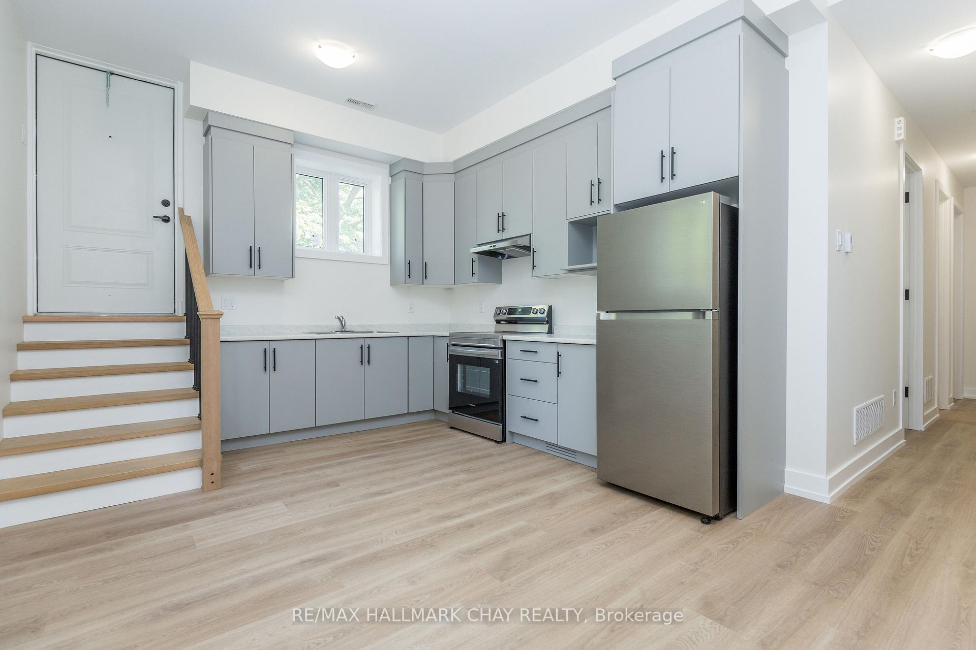 Photo 1 of Unit 1, 58 Ansley Road, Wasaga Beach — HOMEH