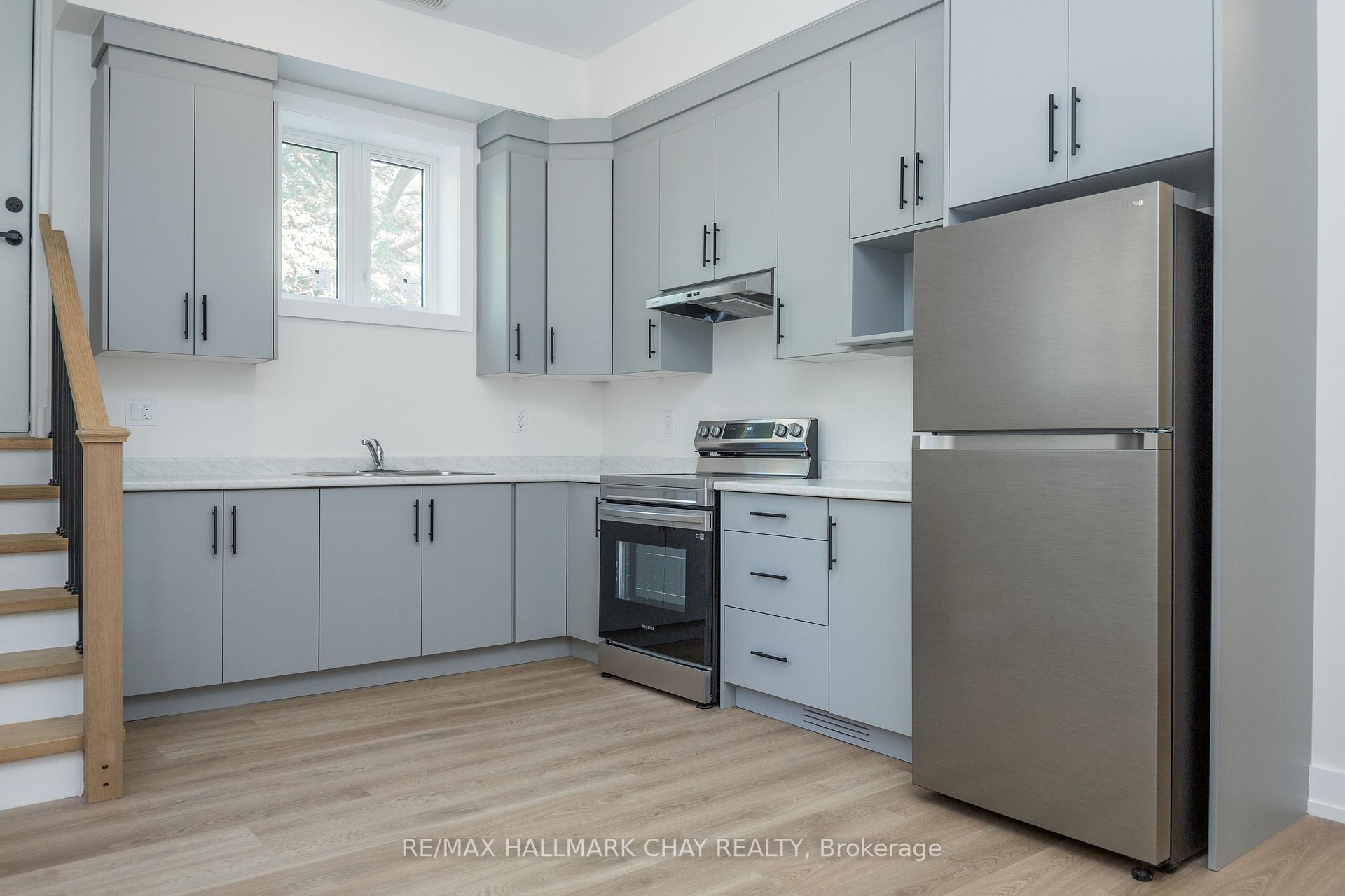 Photo 2 of Unit 1, 58 Ansley Road, Wasaga Beach — HOMEH