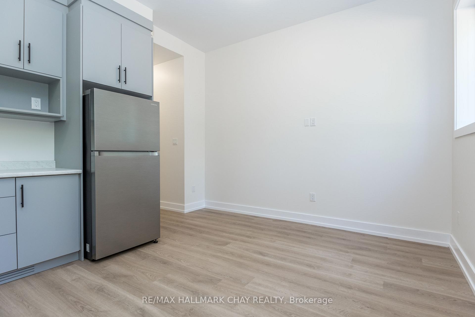 Photo 4 of Unit 1, 58 Ansley Road, Wasaga Beach — HOMEH