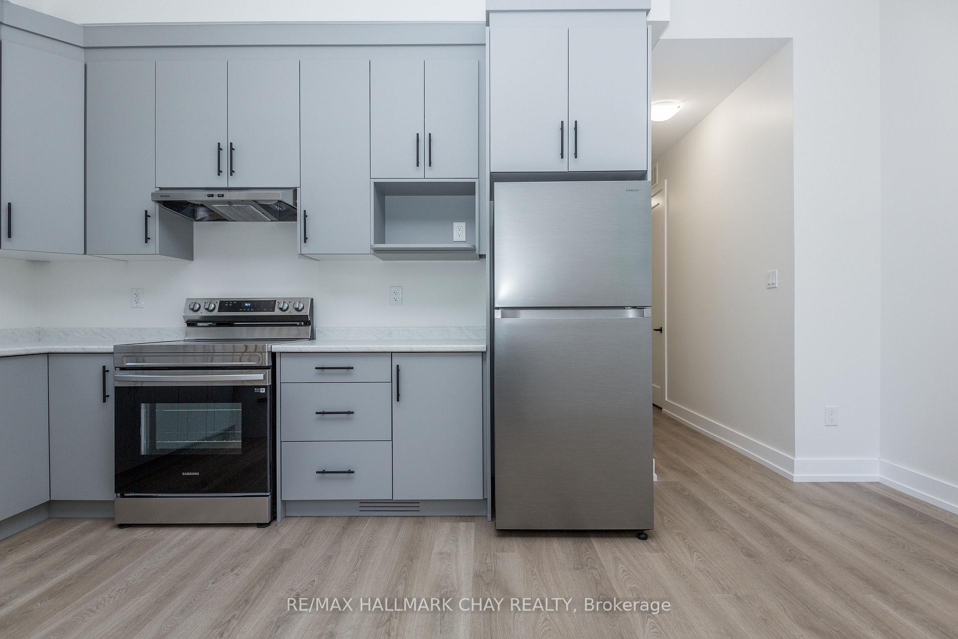 Photo 5 of Unit 1, 58 Ansley Road, Wasaga Beach — HOMEH