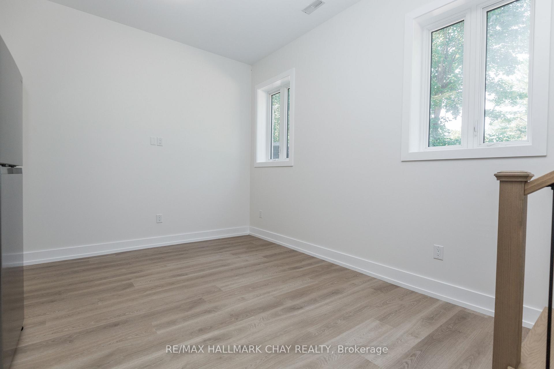 Photo 6 of Unit 1, 58 Ansley Road, Wasaga Beach — HOMEH