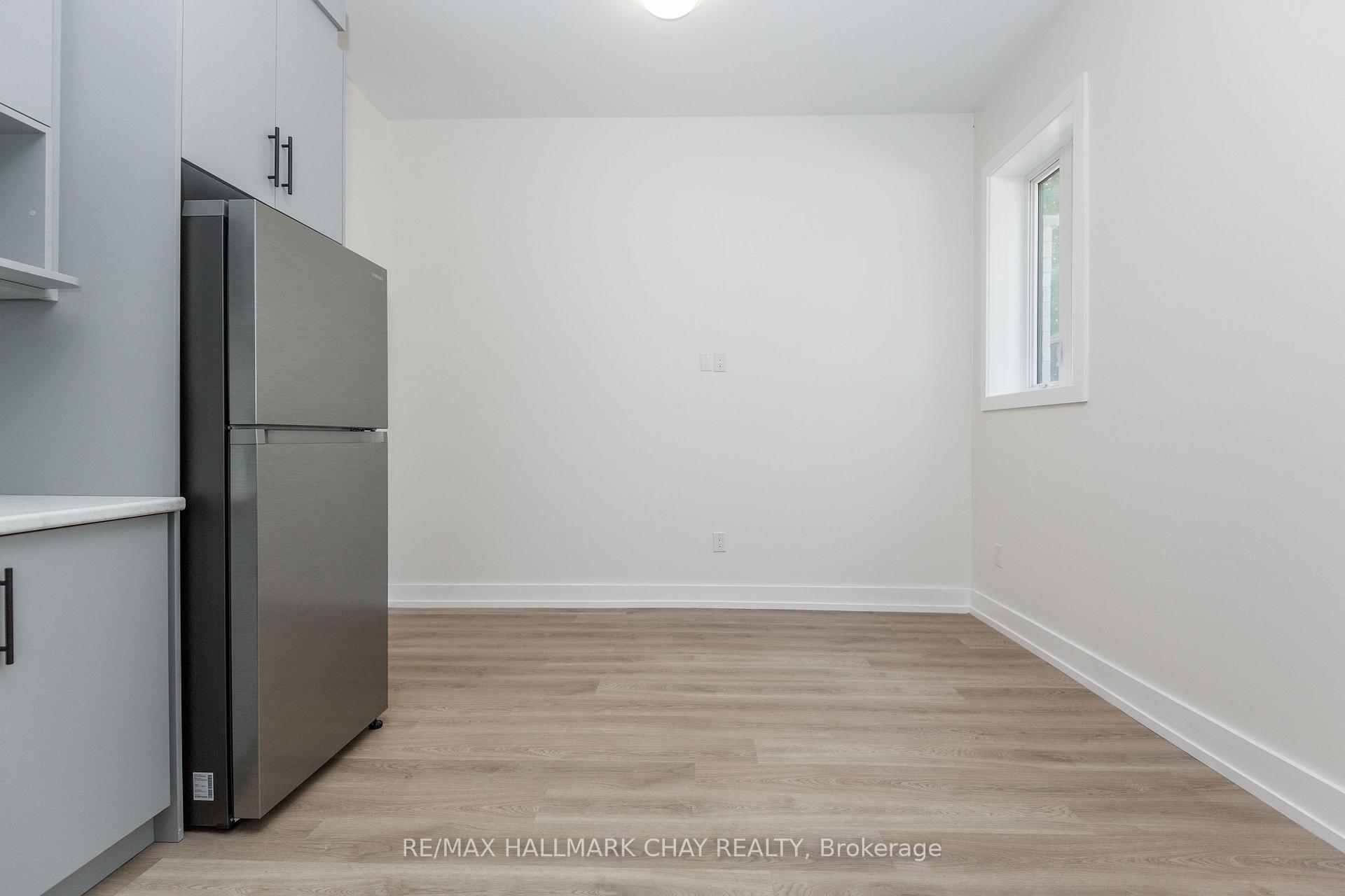 Photo 7 of Unit 1, 58 Ansley Road, Wasaga Beach — HOMEH