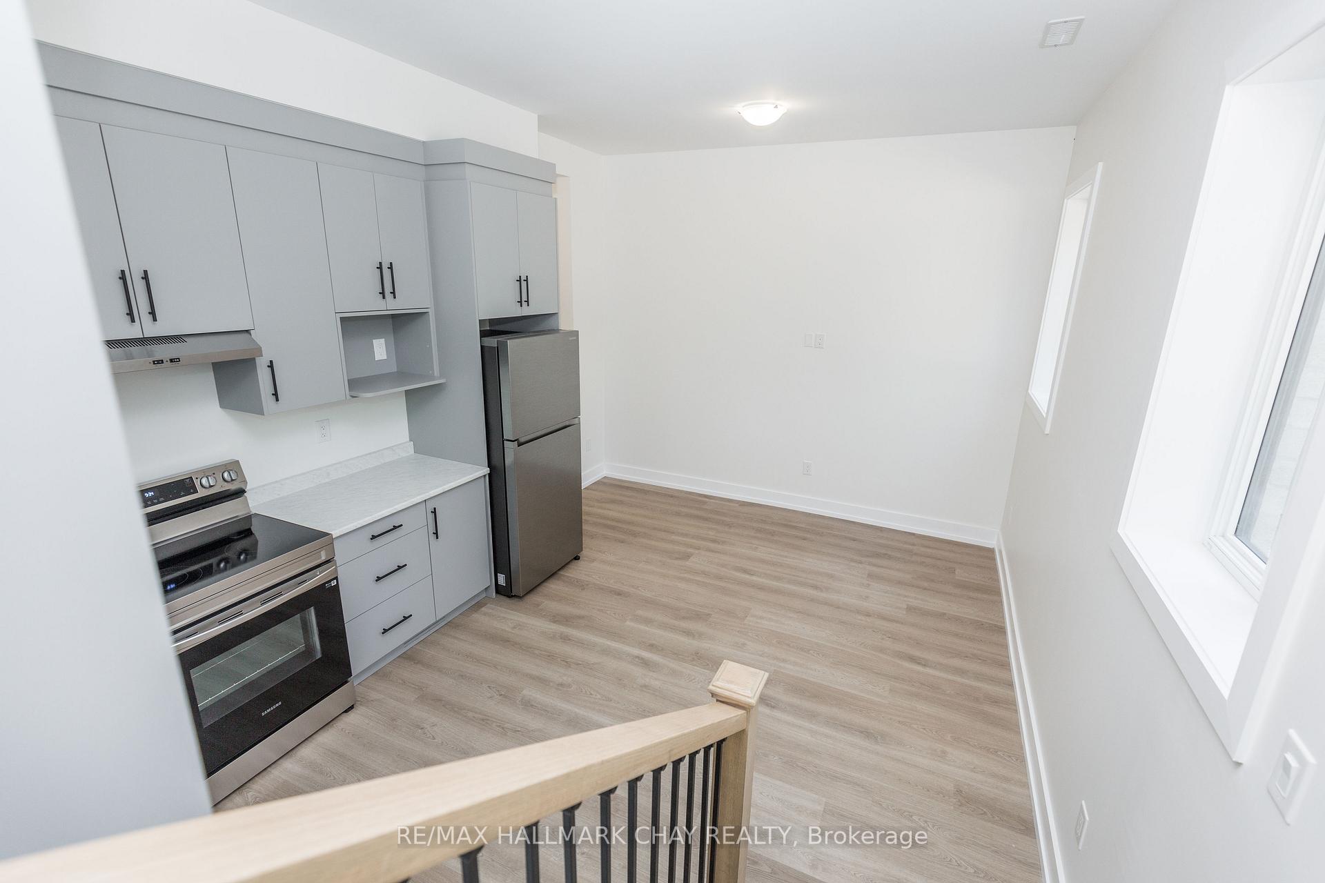Photo 8 of Unit 1, 58 Ansley Road, Wasaga Beach — HOMEH