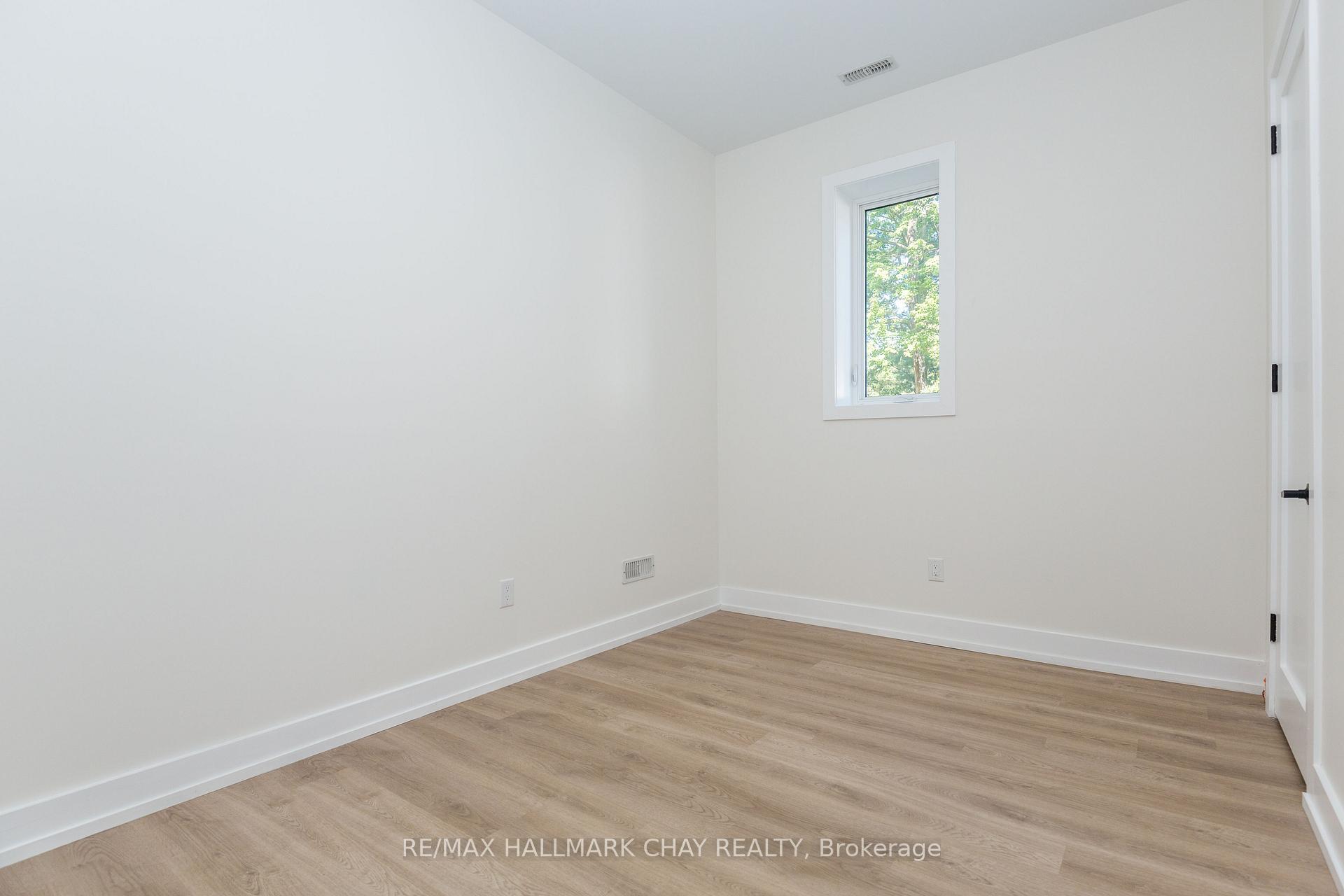 Photo 11 of Unit 1, 58 Ansley Road, Wasaga Beach — HOMEH