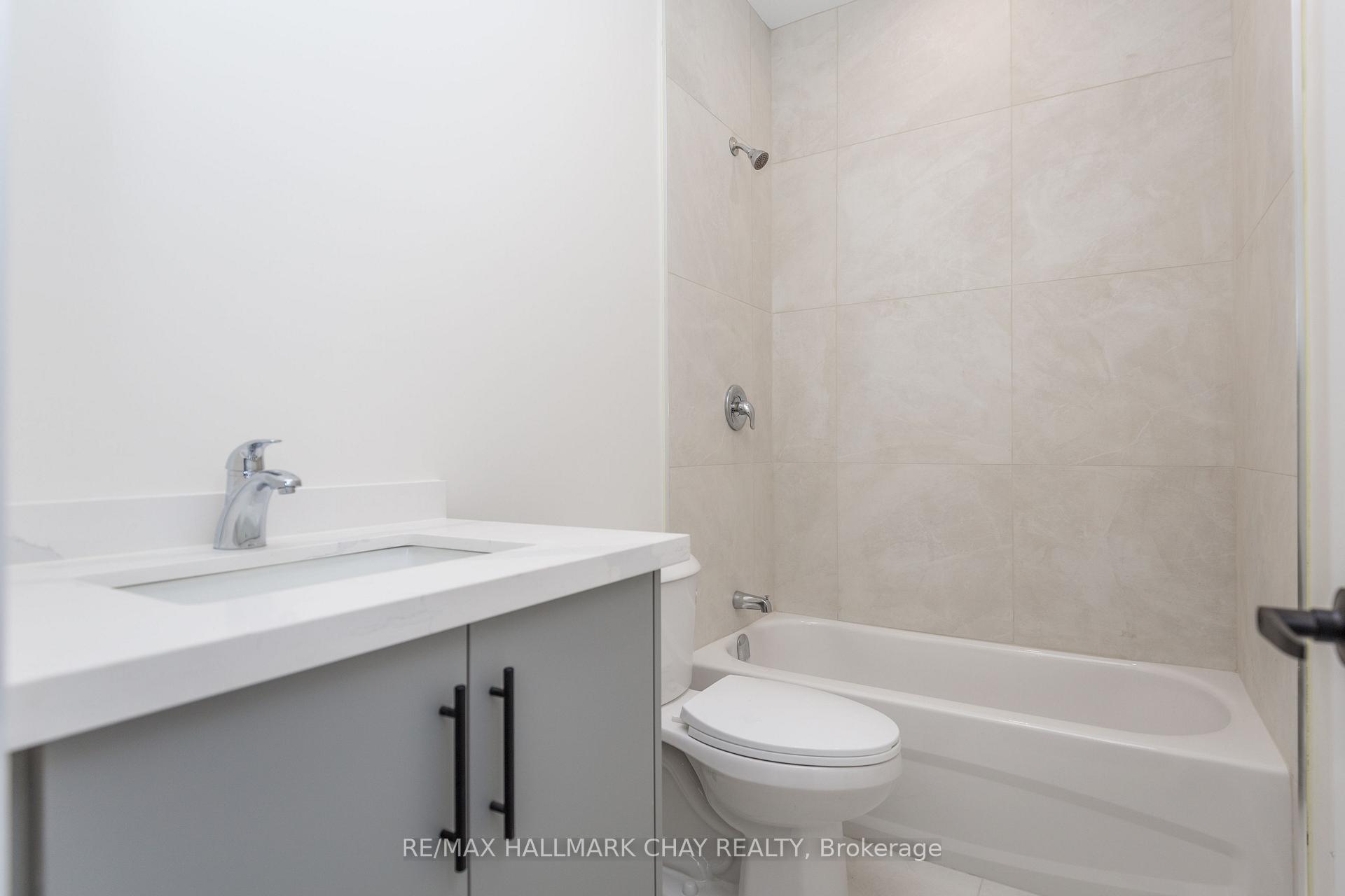 Photo 13 of Unit 1, 58 Ansley Road, Wasaga Beach — HOMEH